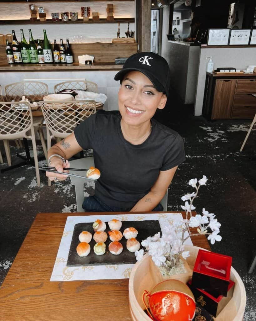 jetlag sarah in a sushi workshop in tokyo jetlag travel beauty essentials