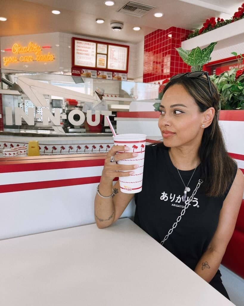 girl in in and out usa solo female travel tips