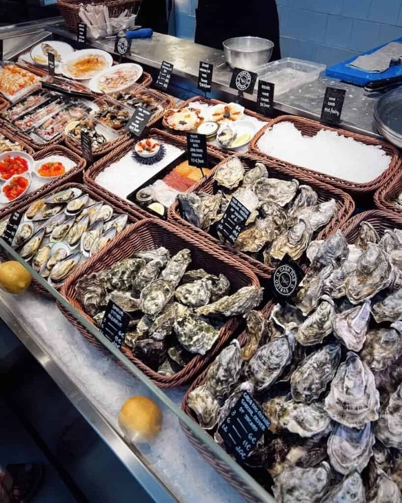 oysters seafood at mercado in porto jetlagsarah solo female travel guide to portugal